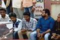 Fathima Medical College students on a protest dharna; student on cell phone tower (inset) - Sakshi Post