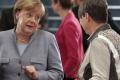 German Chancellor Angela Merkel, left, and German Environment Minister Barbara Hendricks, attend the 2nd summit on air pollution in German cities&amp;amp;nbsp; - Sakshi Post