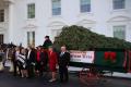 The former Slovenian model toured each of the decorated rooms and wished the public a Merry Christmas, who had received with her the official White House Christmas tree&amp;amp;nbsp; - Sakshi Post