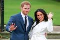 Prince Harry and his American actress fiance Meghan Markle - Sakshi Post