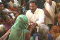 YS Jagan consoling a woman in Dharmavaram constituency YS Jagan consoling a woman in Dharmavaram constituency - Sakshi Post