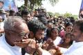 YSRCP chief YS Jagan Mohan Reddy interacts with people on his padayatra YSRCP chief YS Jagan Mohan Reddy interacts with people on his padayatra - Sakshi Post