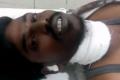 Naresh at hospital after slitting his throat with a blade Naresh at hospital after slitting his throat with a blade - Sakshi Post