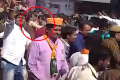 Shivraj Singh Chouhan (encircled) slapping his bodyguard during an election rally.  Shivraj Singh Chouhan (encircled) slapping his bodyguard during an election rally.  - Sakshi Post