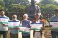 YSR Congress members protested near Mahatma Gandhi statue in Parliament house complex raising slogans demanding ‘justice’ for Andhra Pradesh. YSR Congress members protested near Mahatma Gandhi statue in Parliament house complex raising slogans demanding ‘justice’ for Andhra Pradesh. - Sakshi Post