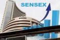 The barometer 30-scrip Sensitive Index (Sensex) of the BSE, which traded at 33,832 points, traded at 33,924.59 points - Sakshi Post