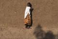 In a 2013 file photo, a girl walks on the ledge of a mud brick house in Gao, Mali. - Sakshi Post