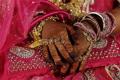 A bride waits for the start of a mass marriage ceremony in Mumbai, India, January 27, 2016. - Sakshi Post