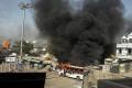 Bus torched by protesters in Alwar - Sakshi Post