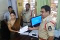 Actress Sri Reddy handing over a copy of her complaint to the Circle Inspector of Humayun Nagar Police Station - Sakshi Post