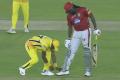 When Gayle was at the batting end, his shoe laces came off and he sought some help from KXIP player Dwayne Bravo. - Sakshi Post