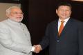 Narendra Modi with Xi Jinping - Sakshi Post
