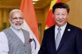 Narendra Modi and  Xi Jinping - Sakshi Post