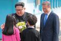 The summit began in the border village of Panmunjom after the leaders met for the first time at the Military Demarcation Line - Sakshi Post