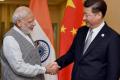 Modi and Xi  said that a healthy Sino-Indian ties were imperative to maintain peace and stability in the world - Sakshi Post