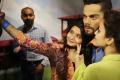 Fans clicking selfies with Virat Kohli’s wax statute - Sakshi Post