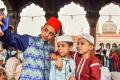 Muslim children pose for a selfie after offering namaz on the occasion of Eid-ul-Fitr at Jama Masjid, in New Delhi   Muslim children pose for a selfie after offering namaz on the occasion of Eid-ul-Fitr at Jama Masjid, in New Delhi   - Sakshi Post