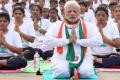 PM Narendra Modi participating in Yoga Day celebrations last year - Sakshi Post