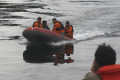 Emergency rescue team members search for victims from a sunken ferry on Toba lake, North Sumatra, Indonesia - Sakshi Post