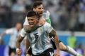 Marcos Rojo celebrates with Lionel Messi after scoring the winner for Argentina vs Nigeria - Sakshi Post