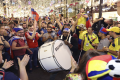 Russian fans near Red Square, Moscow celebrate their victory over Spain in the last 16 at the 2018 FIFA World Cup in Moscow - Sakshi Post