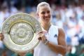 Angelique Kerber poses with the Wimbledon 2018 title. - Sakshi Post