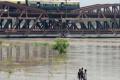 Water released from Haryana’s Hathnikund added to the continued rains have led the Yamuna river to breach its danger-level mark - Sakshi Post