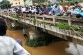 The man being rescued from the drain - Sakshi Post