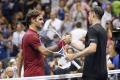 Roger Federer and John Millman - Sakshi Post