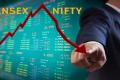 Sensex Down 260 Points, Nifty Trades Around 10,700 - Sakshi Post