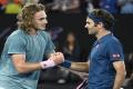 Roger Federer congratulating  Stefanos Tsitsipas after winning their fourth round match - Sakshi Post