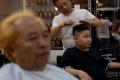 Vietnamese Barber An Expert In Trump, Kim Hairstyles - Sakshi Post