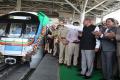 Telangana Governor E S L Narasimhan flagging off the first service. - Sakshi Post