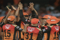 SRH bowler Mohammad Nabi celebrates with his teammates after dismissing RCB batsman AB de Villiers - Sakshi Post