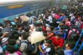 Secunderabad railway statiom was a scene of chaos as passengers jostled for a toehold on train - Sakshi Post