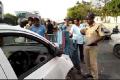 The cab rammed into the iron gates on the median in front of the CM’s camp office - Sakshi Post