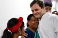 Rahul Gandhi hugs Rajamma - Sakshi Post