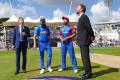 India skipper Virat Kohli won the toss and elected to bat against Afghanistan in their World Cup encounter - Sakshi Post