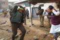 Police lathi-charged at protestors - Sakshi Post