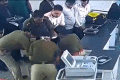 CISF personnels performing CPR to a passenger&amp;amp;nbsp; - Sakshi Post