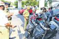 Police seizing vehicles in Hyderabad - Sakshi Post