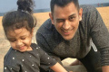 Dhoni playing with Ziva (File Image) Dhoni playing with Ziva (File Image) - Sakshi Post