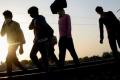 Migrant Labourers walking under scorching sun - Sakshi Post