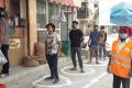 People standing in front of a shop&amp;amp;nbsp; - Sakshi Post