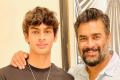 File photo of 1500m Freestyle winner Vedaant Madhavan with his actor-father R Madhavan  - Sakshi Post