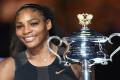 File photo : US Tennis player Serena Williams with a trophy -Sakshi Post