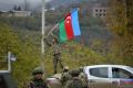 File photo of Azerbaijani soldiers installing the national flag - Sakshi Post