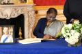 Photo credit: President Droupadi Murmu signing the Condolence Book in the memory of Queen Elizabeth II at Lancaster House, London. ( @rashtrapatibhvn via Twitter ) - Sakshi Post