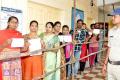 Voters queue up at a polling booth APMLCElections - Sakshi Post