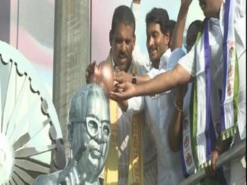 YS Jagan Mohan Reddy Cleanses Ambedkar Statue with Milk - Sakshi Post